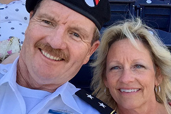 NU Alumni, Robert and Cindy Hipwell pose for a photo