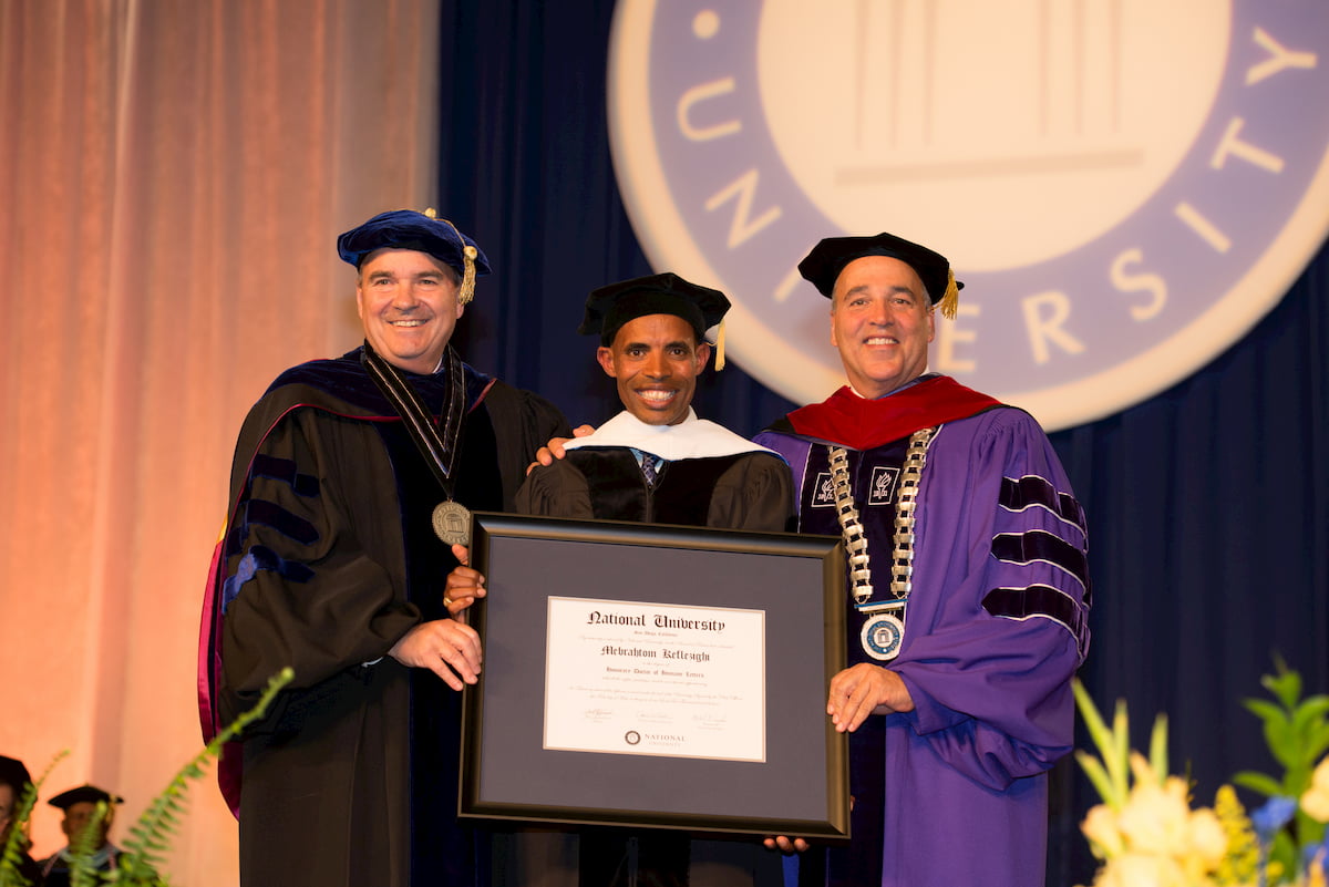 President Dr. David W. Andrews, Chancellor Dr. Michael R. Cunningham, Meb Keflezighi