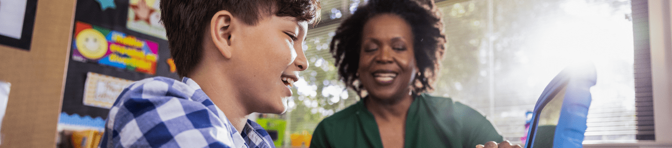  a teacher working with her student incorporating social emotional learning practices 