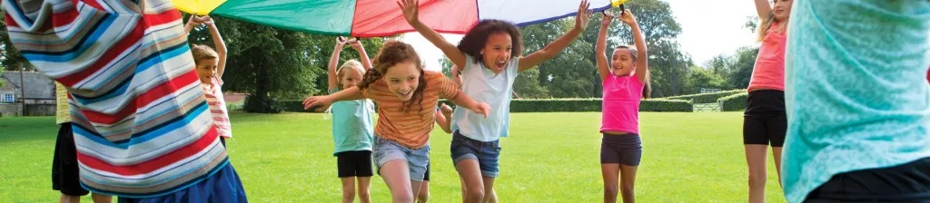 Learning Theories Theories of Learning in Education in practice with school children running under a tarp